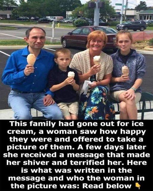 This woman offered to take a picture of a family that seemed very happy that they went for ice cream together