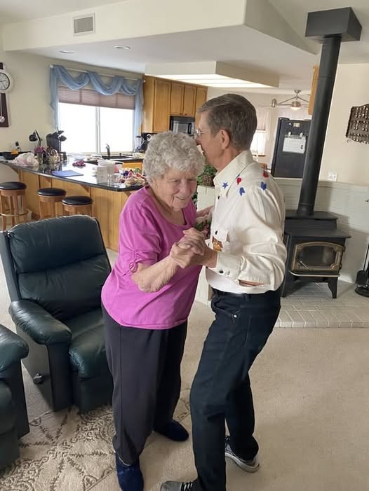 THEY WERE DANCING IN THE LIVING ROOM LIKE NOTHING HAD HAPPENED