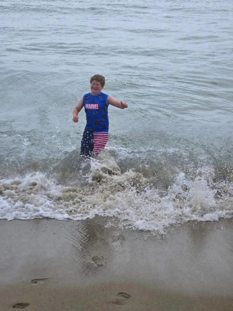 Mom issues warning as son, 10, collapses after playing in ocean