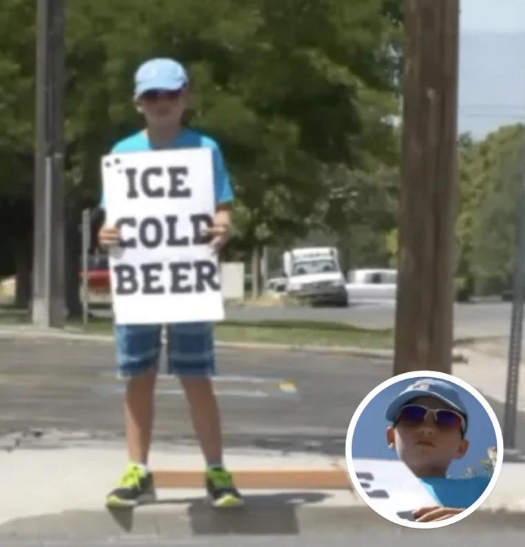 Cops Called On Boy Selling ‘Ice Cold Beer’, Burst Out Laughing When They Look Closer At Sign
